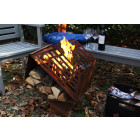 Chauffe-terrasse en fonte avec stockage de bois