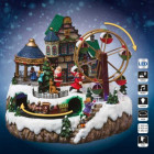 Village de noël grande roue et train autour de minuit