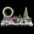 Village de noël lumineux : parc d'attraction / fête foraine avec grande roue