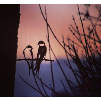 Oiseaux sur pique couple d'hirondelles en acier corten