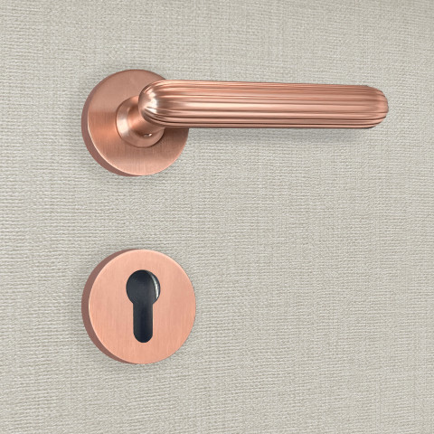 Poignée de porte design à cylindre finition aspect or rose livia - katchmee