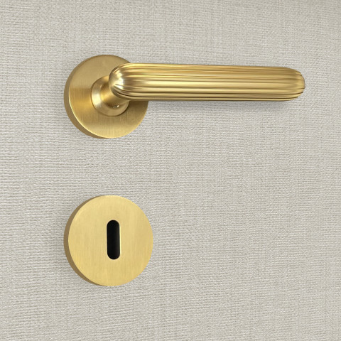 Poignée de porte design à clé finition aspect or mat tina - katchmee