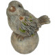 Oiseau sur sa pierre en résine 29 cm