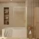 Pare baignoire rabattable 80x140cm - profilé or doré brossé - verre trempé ondulé 5mm Aurlane - FAC1038