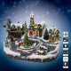 Village de noël avec église, sapin de noël et traineau